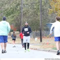 A runner finishing the race